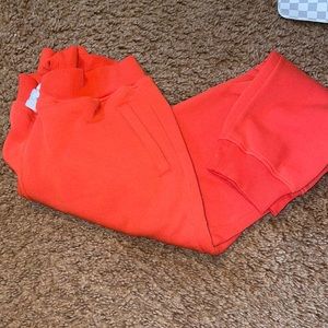 Orange joggers size large